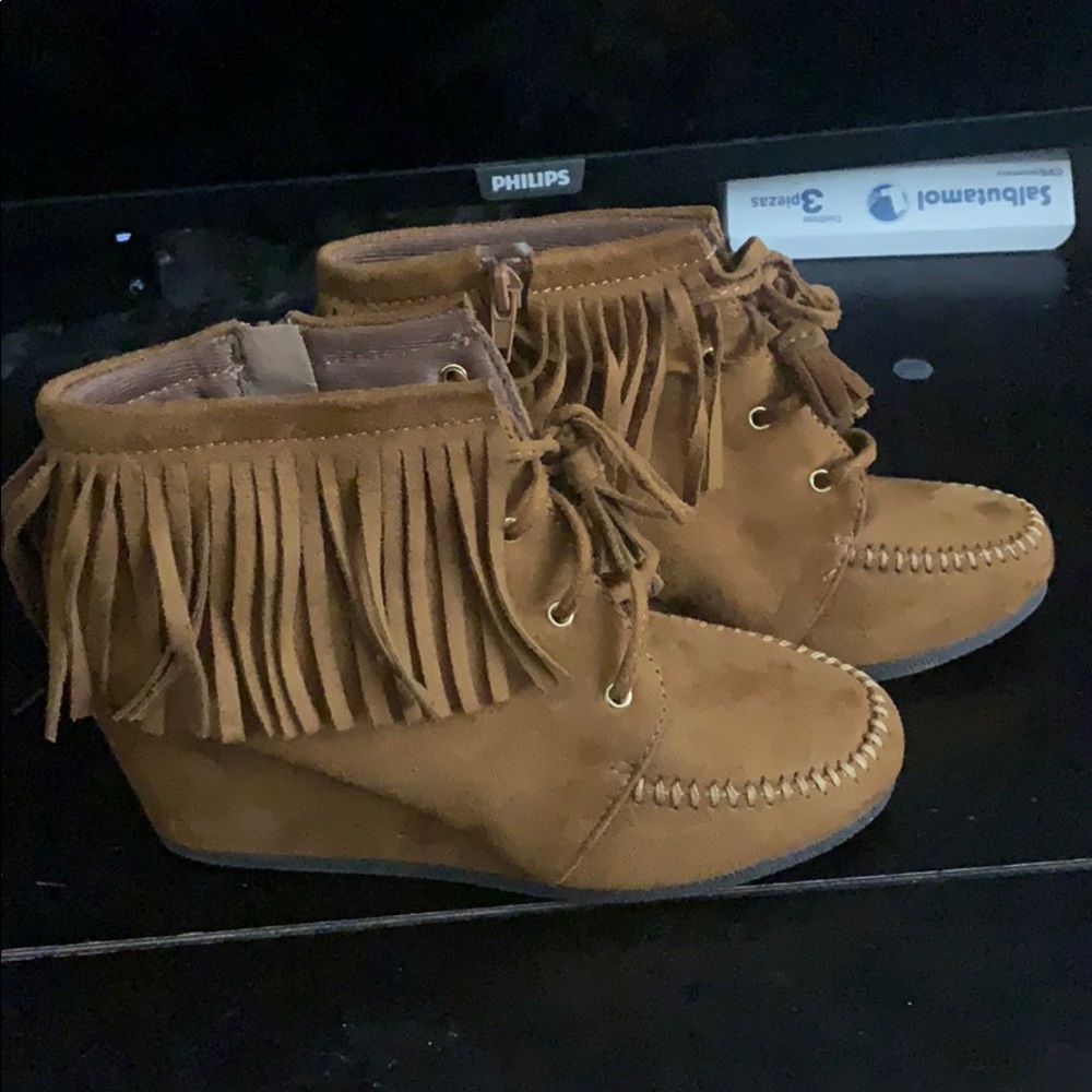 Brown moccasin wedges